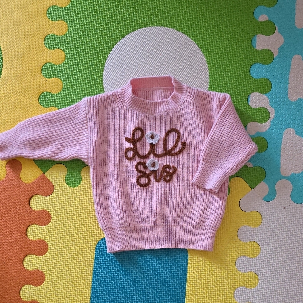Pink Knit Sweater with Floral Design